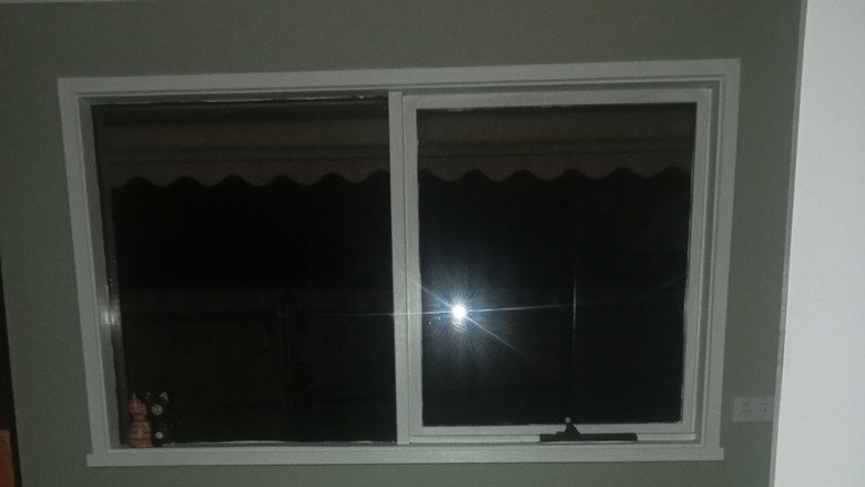 The man in the window still 1